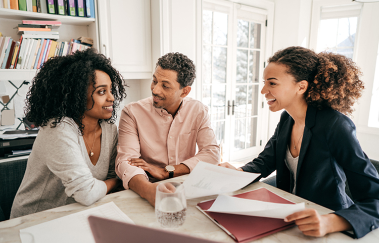 Three people discussing fund name changes